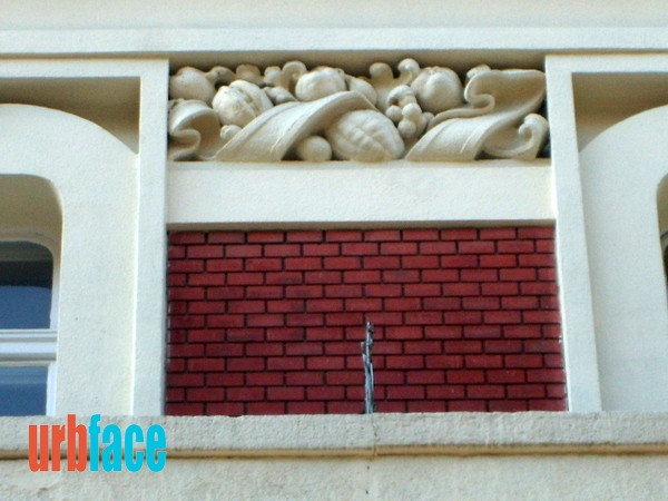 Ornaments of the facade, between two windows