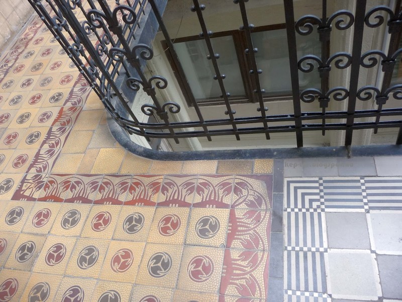The tile flooring on the corridor