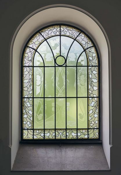 Arched glass window