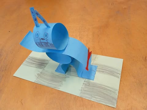 Táncoló papírbaba - robot nyúl gitárral