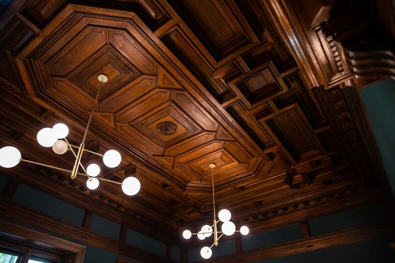 The original wood-paneled ceiling