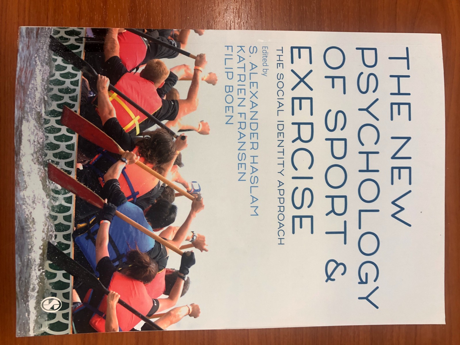 S. Alexander Haslam, Katrien Fransen és Filip Boen The New Psychology of Sport and Exercise című könyvének borítója.