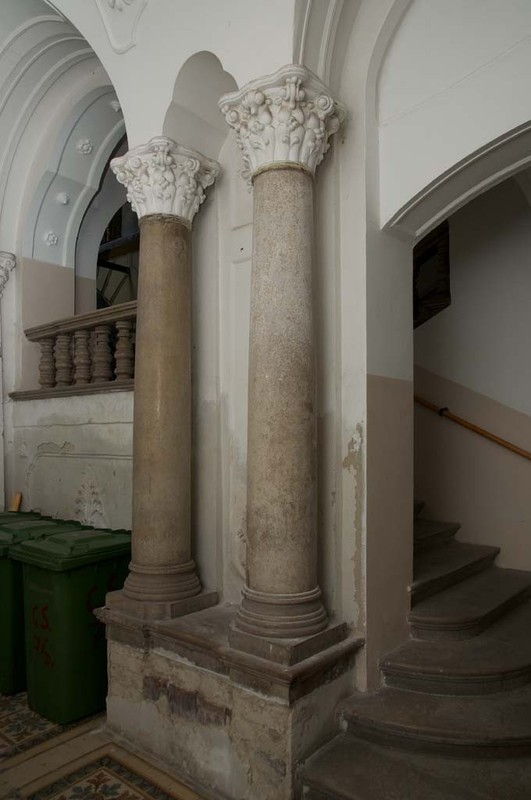 A pair of marble columns by the main staircase