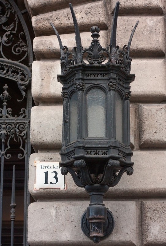 The iron lantern on the facade