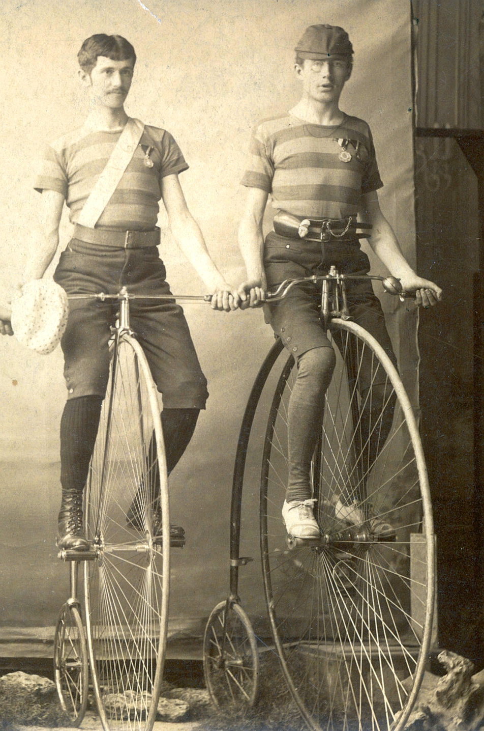 Penny-farthing cyclists at the turn of the last century 