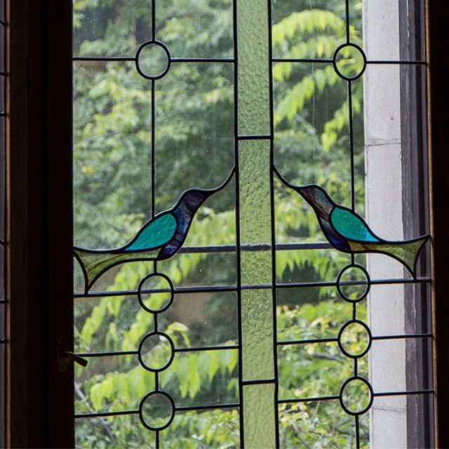 Birds on the windows of the small parlour room